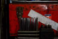 Tool box and hole punches.