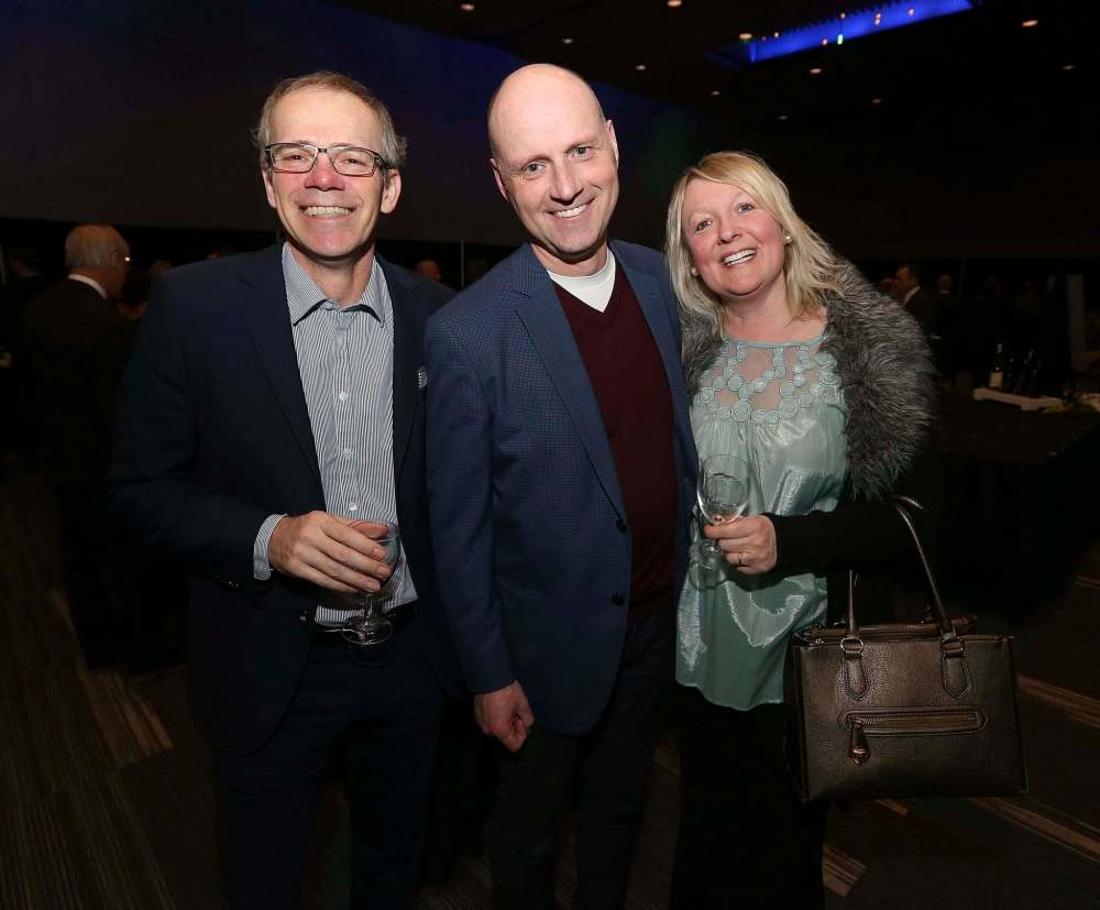 From left: Winnipeg Free Press publisher Bob Cox, Editor Paul Samyn and Cathy Samyn.