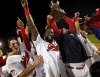 Winnipeg Goldeyes hoist the championship cup after taking the American Association Championship over the Wichita Wingnuts.