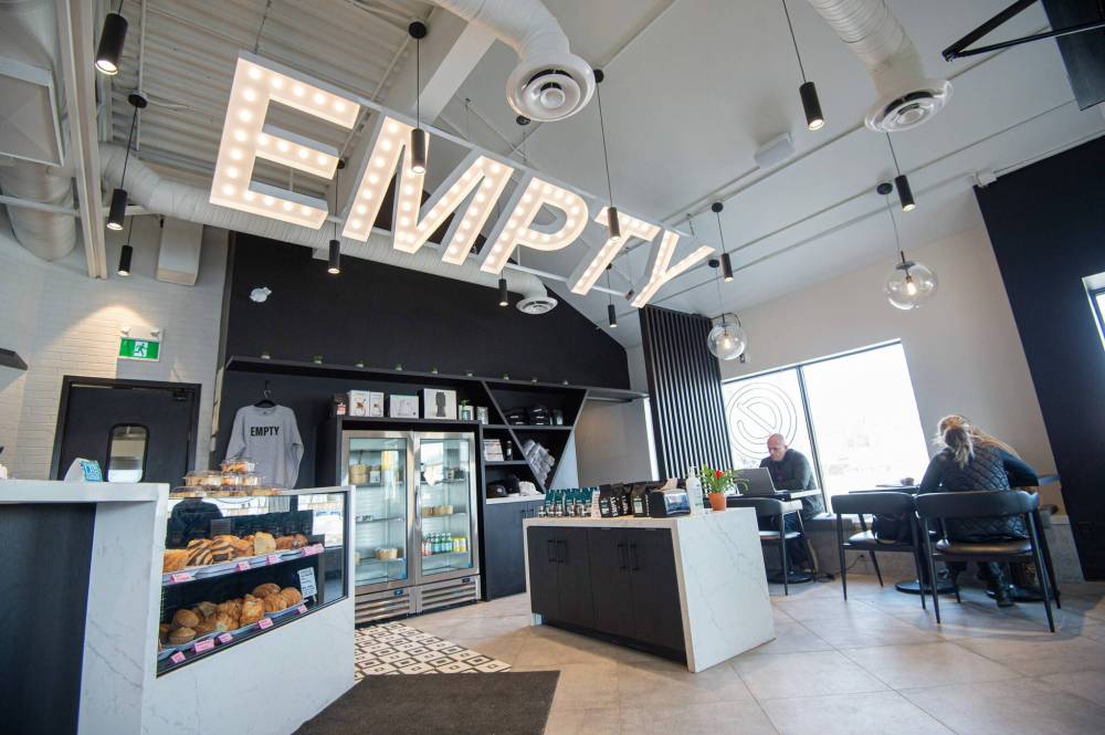 A large ‘empty’ sign hangs over the counter at both locations; the name is a play on Marc Tallman’s initials, M.T. (Mike Sudoma / Winnipeg Free Press)