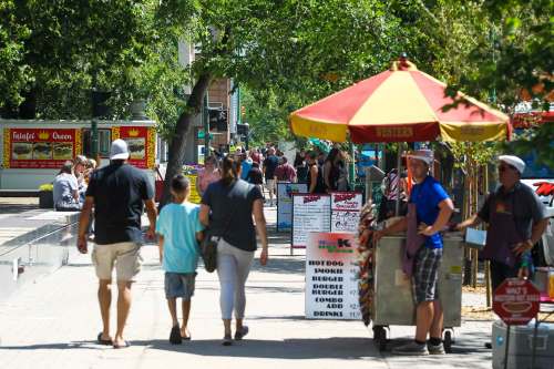 Office workers hit the street looking for food trucks on Broadway during the lunch hour.