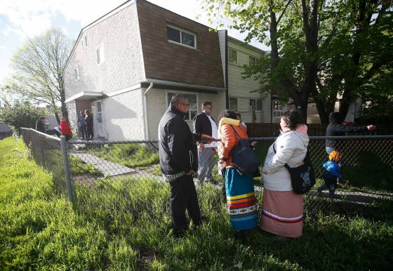JOHN WOODS / WINNIPEG FREE PRESSFamily and friends gather for a vigil for Tessa Perry who died on the weekend after a serious assault outside her home on Marlow Court in Winnipeg Tuesday.