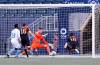 Valour FC William Akio (19) scores on FC Edmonton Andreas Raido Karuks Vaikla (1) during extra time Sunday afternoon in Winnipeg. (John Woods / Winnipeg Free Press)