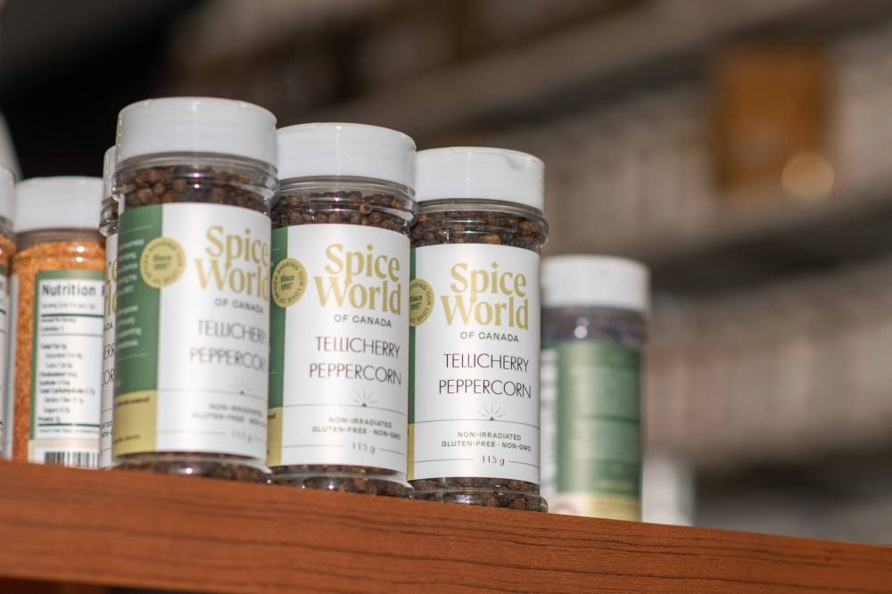 ETHAN CAIRNS / WINNIPEG FREE PRESS The Delos Santos family displays many different spices and seasonings.