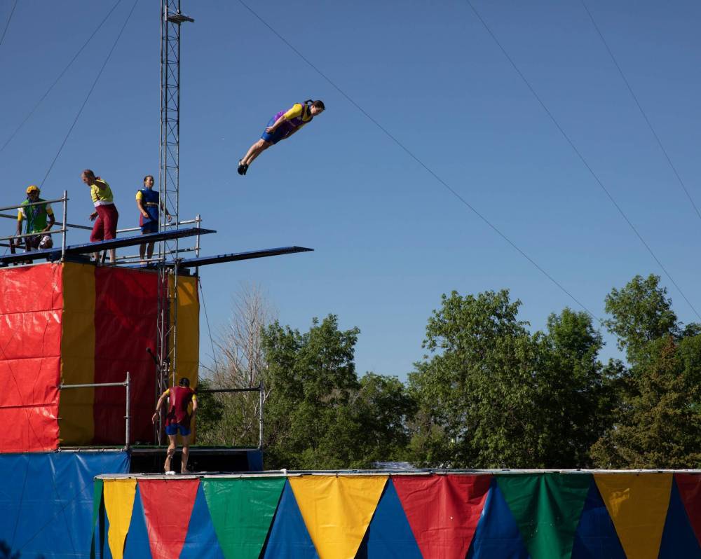 JESSICA LEE / WINNIPEG FREE PRESS
A high-diver takes a giant leap at the Red River Ex on Friday.