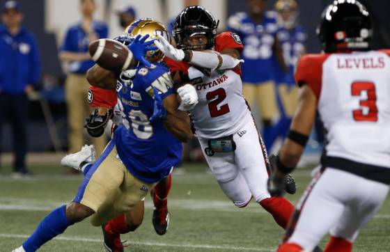 John Woods / THE CANADIAN PRESSOttawa Redblacks’ Randall Evans defends against Winnipeg Blue Bombers’ Rasheed Bailey during the second half of CFL action in Winnipeg last week.