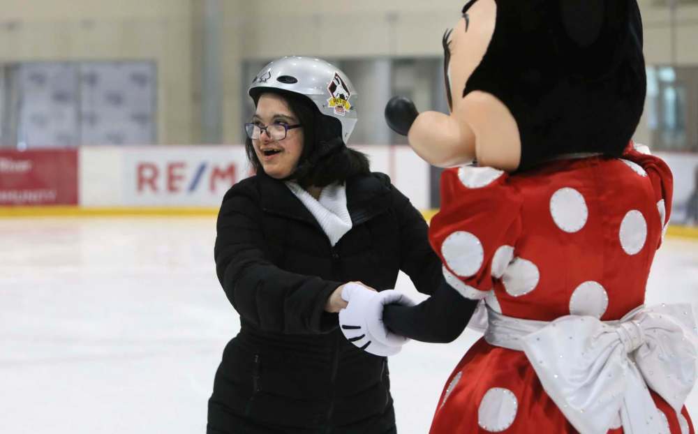Ruth Joseph skates with Minnie Mouse.