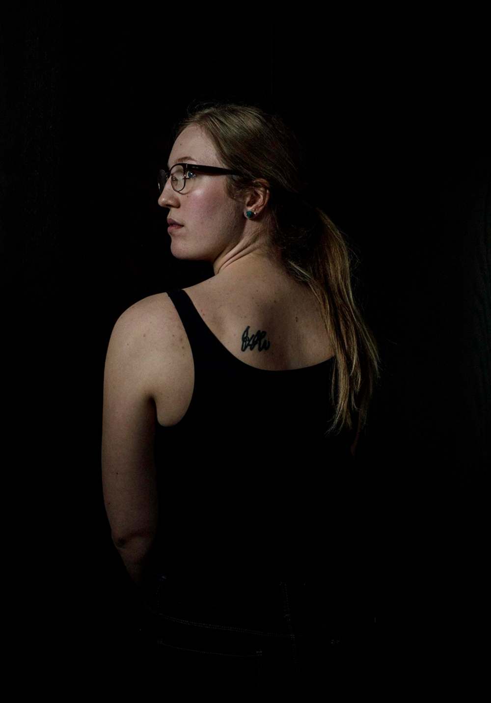 Taylor Joseph shows a tattoo of her late brother Jaxon's signature. (Jason Franson / The Canadian Press)