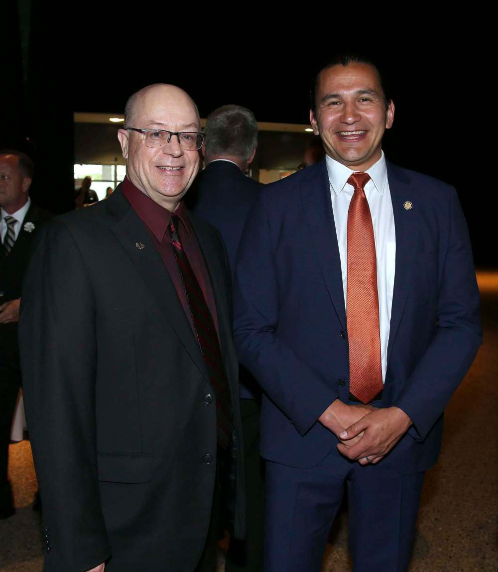 Leo Van Den Bussche, left, and Wab Kinew.