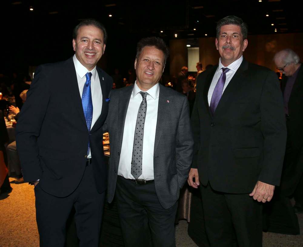 From left: Sudhir Sandhu, Manitoba Infrastructure Minister Ron Schuler and Neil Cooke.