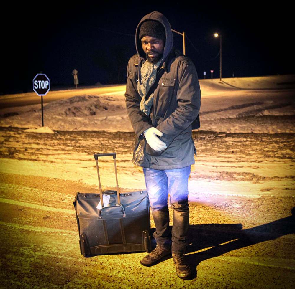 MARCH 2017: Refugee Morris De Morais endures -30 C weather trekking to Emerson. He and others crossed the border on foot in search of a new life.