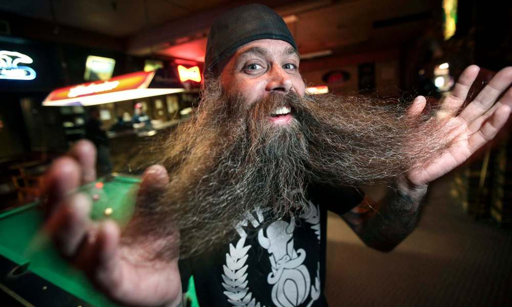 APRIL 2014: Don McPhail shows off his beard at an evening meeting of the Manitoba Facial Hair Club.