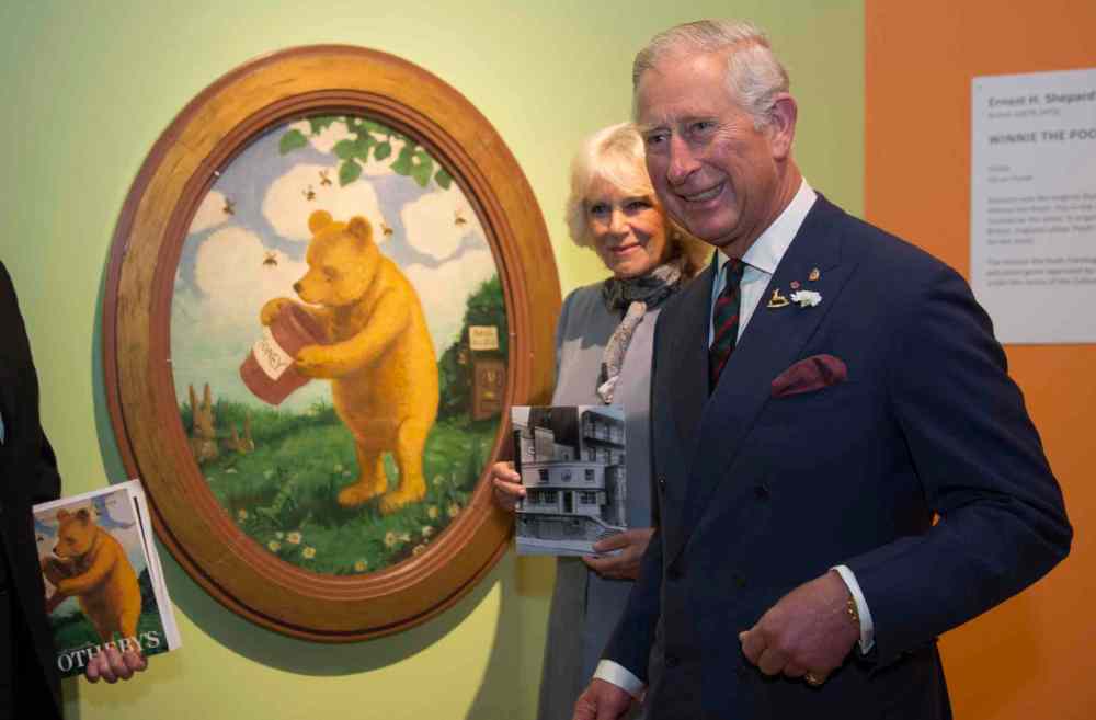 Paul Chiasson / The Canadian Press
Prince Charles and his wife Camilla at the Pooh Gallery, which houses a collection of Winnie the Pooh artifacts and memorabilia, including the first painting of Winnie the Pooh by E.H. Shepherd,