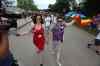 RUTH BONNEVILLE / WINNIPEG FREE PRESS
Michelle McHale and her partner Karen Phillips hold hands as they lead thousands of supporters down the streets of Steinbach.