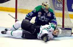 BORIS MINKEVICH / WINNIPEG FREE PRESS
Portage #19 Carson Perreaux lays down in front of Melfort goalie #35 Richard Palmer.