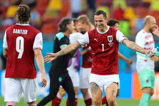 CPAustria's Marko Arnautovic celebrates after the Euro 2020 soccer championship group C match between Ukraine and Austria at the National Arena stadium in Bucharest. (Marko Djurica / Pool via AP)