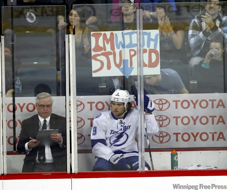 Winnipeg Free Press
A fan at the Winnipeg Jets' game Monday holds up a sign as Tampa Bay's Steve Downie serves a penalty during the second period at the MTS Centre Monday.