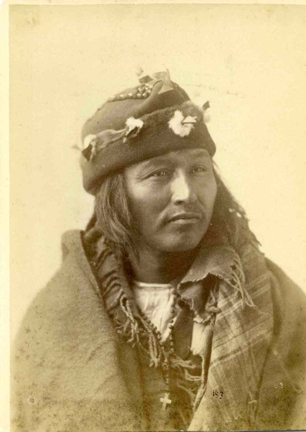 UNIVERSITY OF MANITOBA ARCHIVES AND SPECIAL COLLECTIONS
Portrait of an Indigenous man wearing a decorated cap in the 1880s. The subjects in the photographs were reportedly paid for the use of their imagery in photographs sold by Hall & Lowe Studio. The photographs held at the U of M Archives & Special Collections were inherited by Connie Macmillan from her in-laws, Pat and Jack Macmillan, who may have in turn acquired the collection from their relatives, Norman and Ethel-Mae Burke. The U of M Archives purchased the collection in 2011 via Greenfield Books.