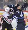 JOE BRYKSA / WINNIPEG FREE PRESS
Winnipeg Jets Chris Thorburn and Chicago Blackhawks Daniel Carcillo fight minutes into the first period during NHL hockey at the MTS Centre in Winnipeg Friday night. Carcillo was suspended by the NHL after a vicious crosscheck on Mathieu Perreault in Chicago Jan 16, 2015.