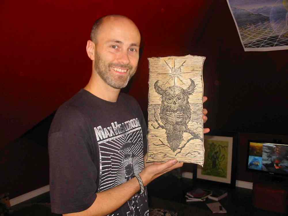 Bill Redekop / Winnipeg Free Press
Darcy J. Watt with a woodcut of a mythic creature.