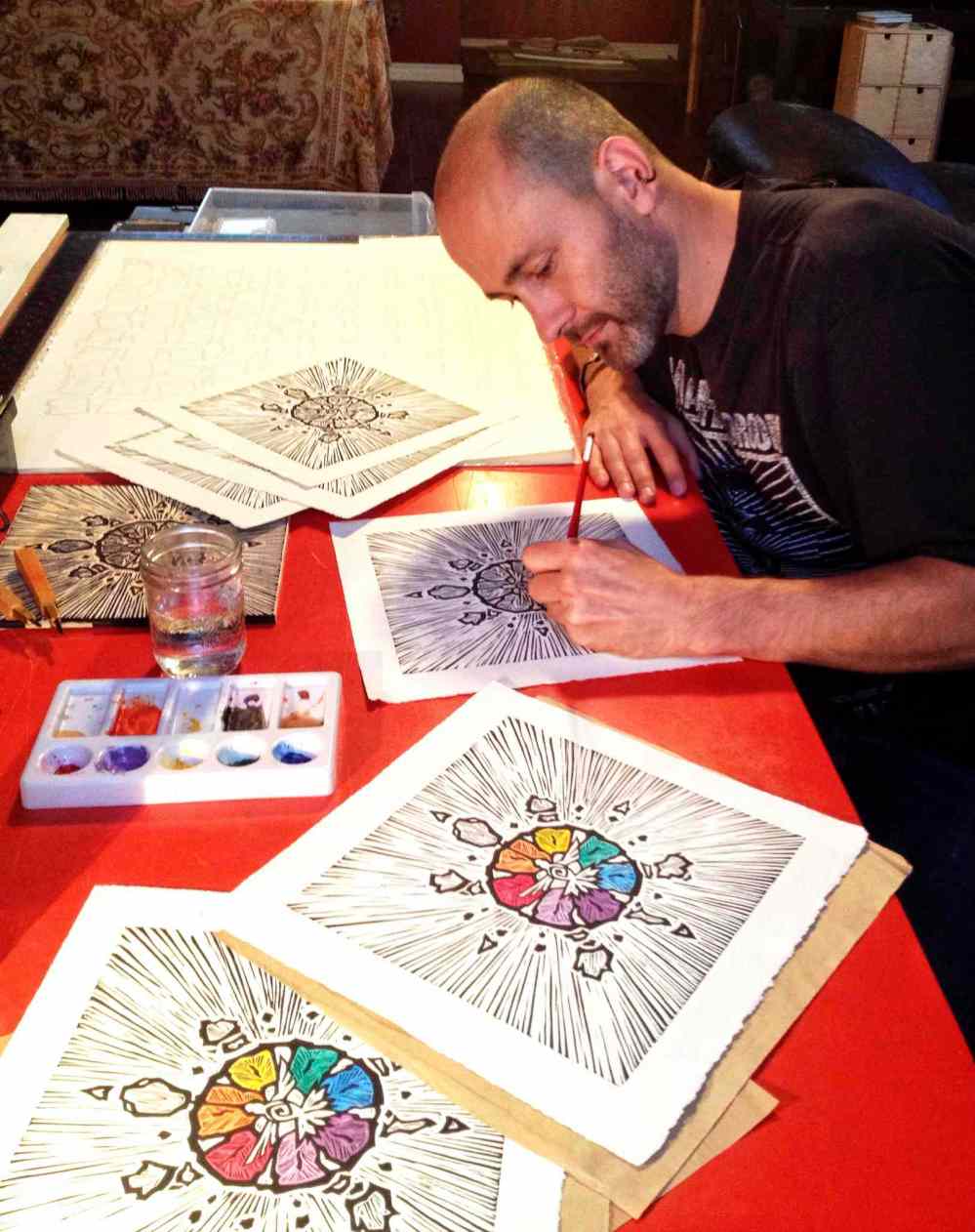 Bill Redekop / Winnipeg Free Press
Darcy J. Watt works on some art.