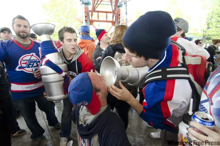 David Lipnowski / The Canadian Press
Winnipeg hockey supporters rally at The Forks in Winnipeg on Tuesday after the announcement that an NHL team will be returning to the city after 15 years.