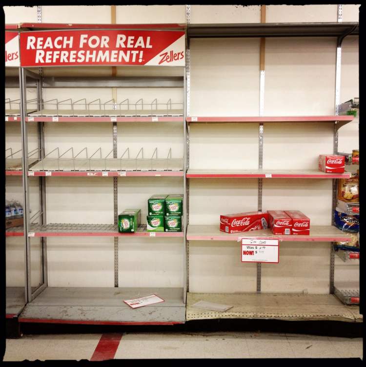 Mike Deal / Winnipeg Free Press
Cans of soda pop seem to be a popular item in a store about to close.