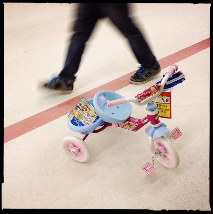 Mike Deal / Winnipeg Free Press
A child's tricycle sits in the middle of the isle.