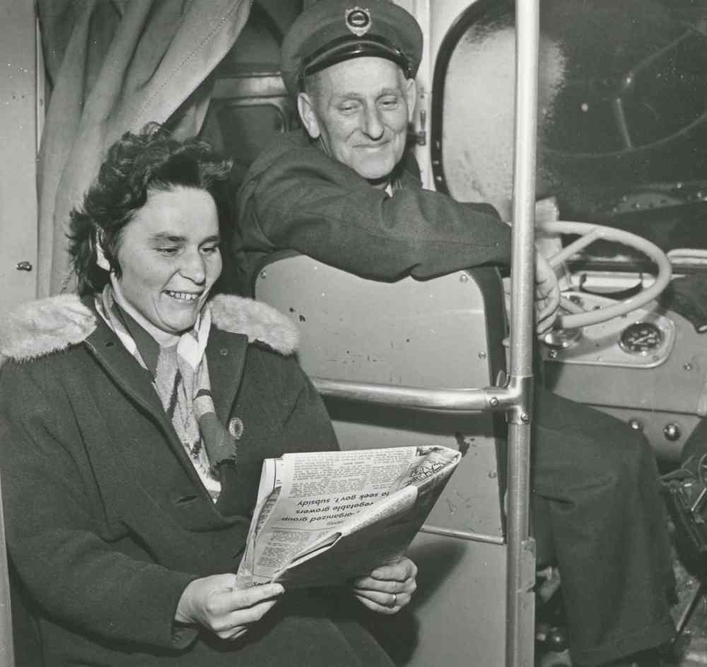 A driver and passenger who spent all day and night aboard a transit bus. (Jack Ablett / Winnipeg Free Press Archives)