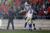 Nic Demski, Dalton Schoen and Greg Ellingson celebrate Schoen’s touchdown during the seconde half on Friday in Ottawa. (Lars Hagberg / The Canadian Press)