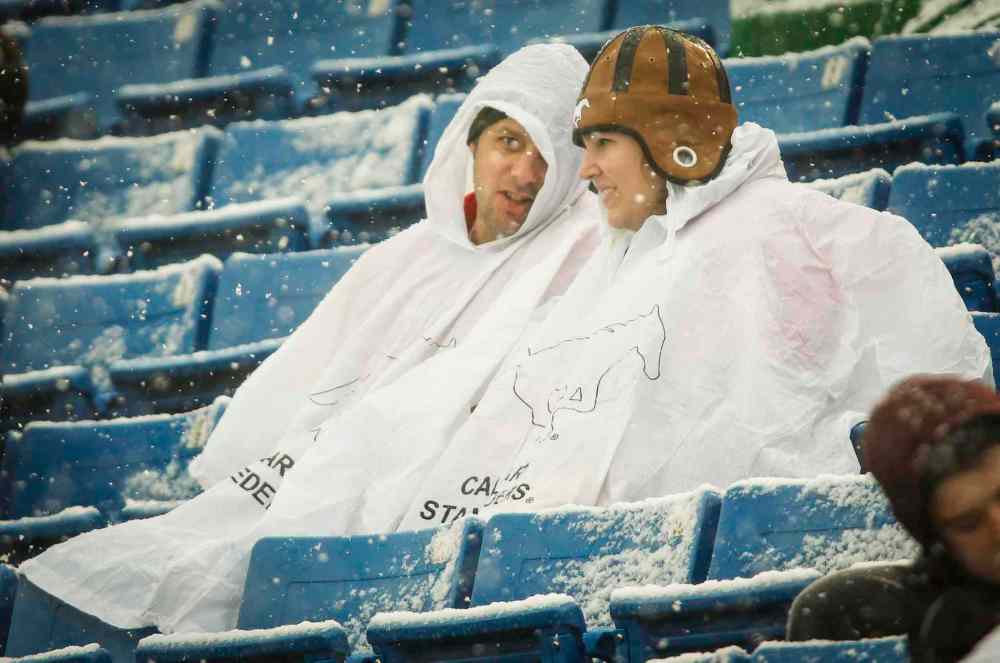 Jeff McIntosh / The Canadian Press
Fans brave winter conditions in the second half of the game to watch the Winnipeg Blue Bombers play the Calgary Stampeders in Calgary Saturday.
