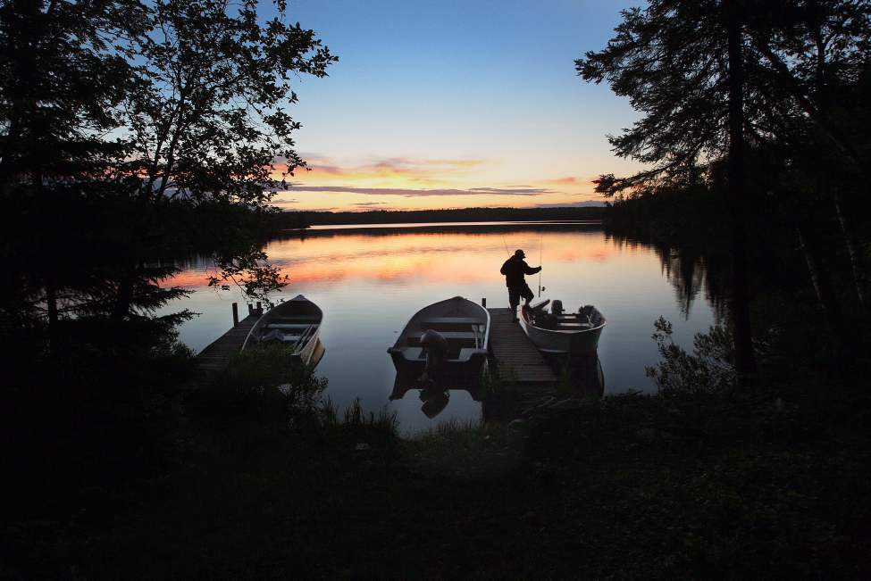 Matt McCorquodale heads out for a morning fish on Marion Lake in Whiteshell Provincial Park. June 19, 2013 (JOE BRYKSA / WINNIPEG FREE PRESS)