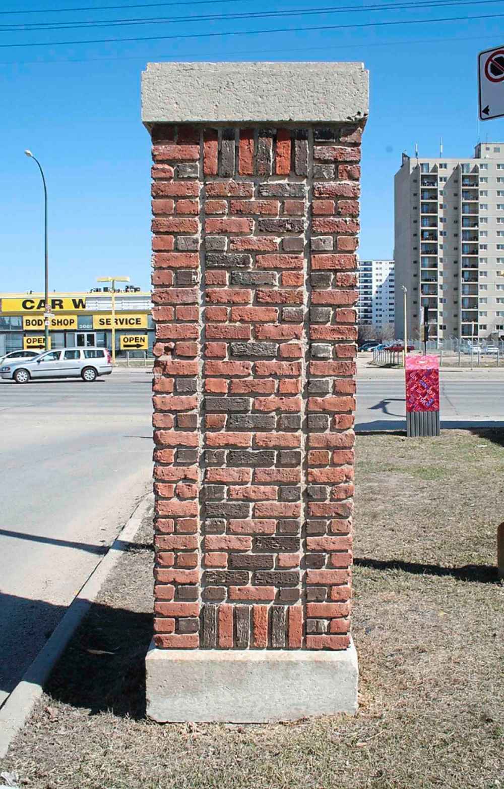 City of Winnipeg
Rejected: It's not known when a pair of street pillars at Country Club Boulevard and Portage Avenue were built; they originally included chains to close off road access to the St. Charles Country Club, which opened in 1904. They were originally topped with wrought-iron electric lights, which were removed in the 1970s. Only one of the pair remains; the other was demolished sometime after 1971, when the country club sold 22 hectares of land to a land developer for a residential neighbourhood, and the Portage Avenue entrance to the club was no longer relevant. The club built a second entrance south of Meadowside Drive using the iron lights from these pillars.