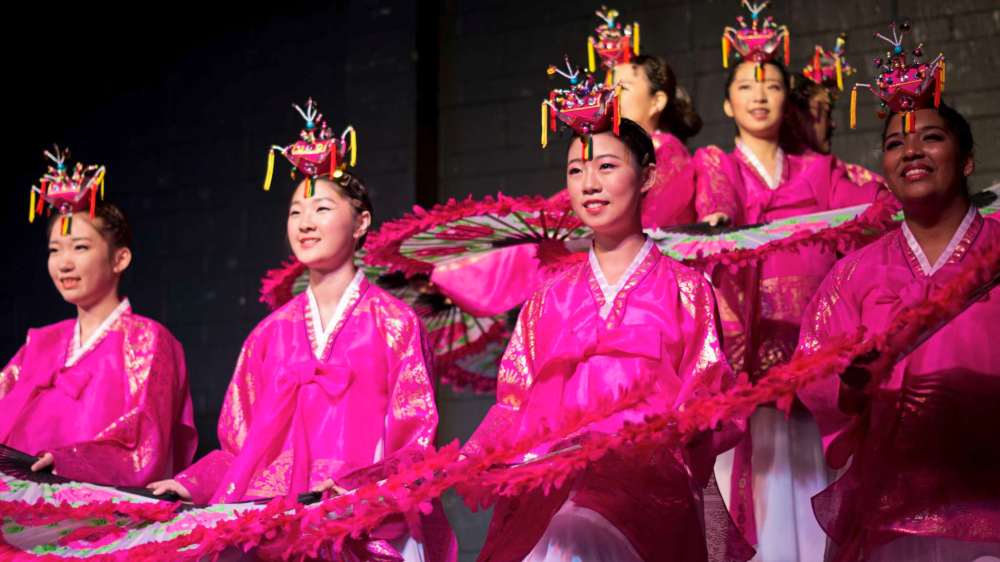 Danielle Da Silva - Sou'wester
Performers at the Korean pavilion (1720 John Brebeuf Pl.) show off a colourful fan dance.