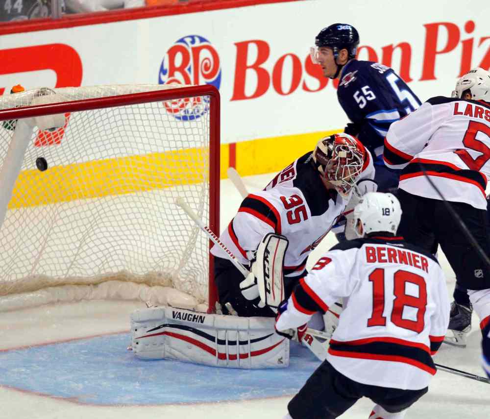 BORIS MINKEVICH / WINNIPEG FREE PRESS
Mark Scheifele scores the Jets' second goal during the second period of Tuesday's game.