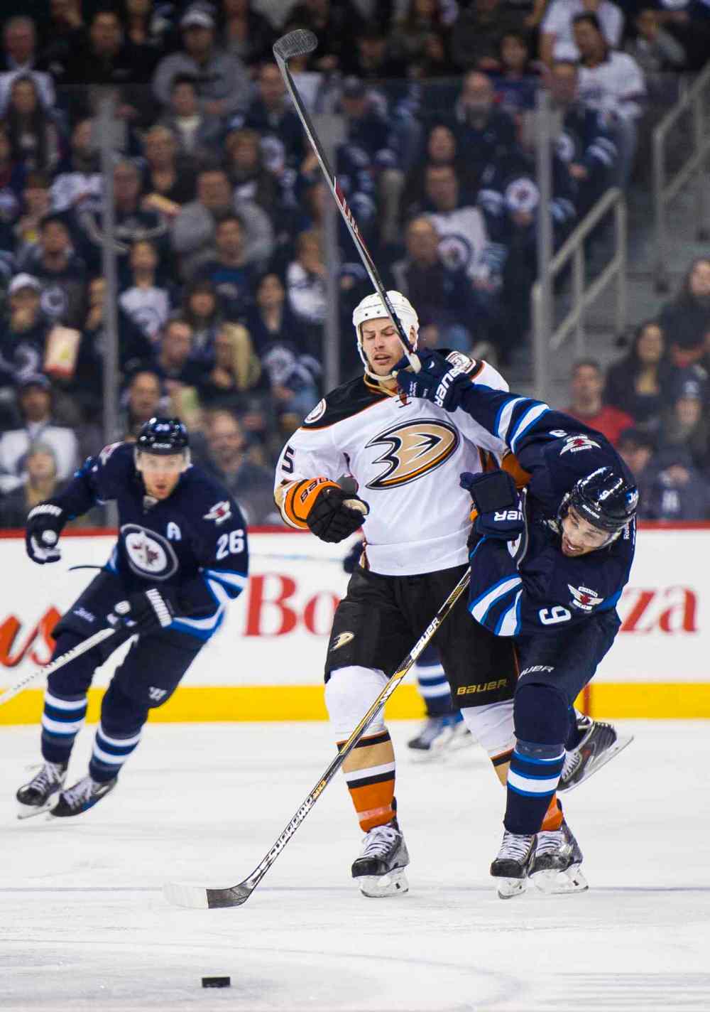 DAVID LIPNOWSKI / WINNIPEG FREE PRESS
Winnipeg Jets Evander Kane (#9) wrestles for the puck with Anaheim Ducks Ryan Getzlaf (#15) during the second period of Saturday's game.
