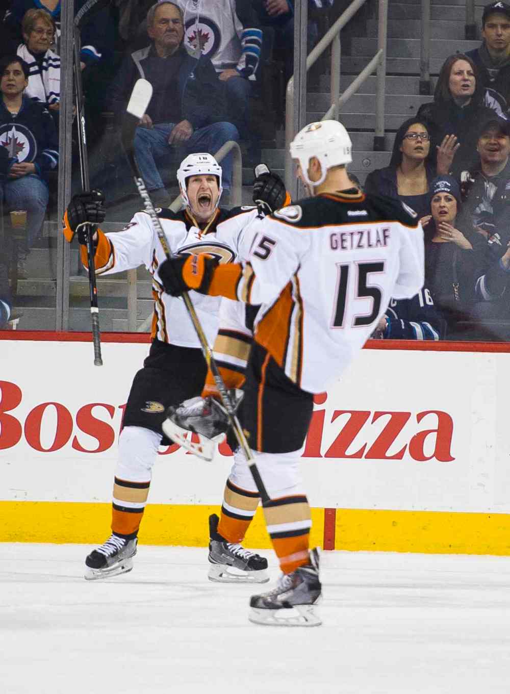 DAVID LIPNOWSKI / WINNIPEG FREE PRESS
Anaheim Ducks Tim Jackman (#18) and Ryan Getzlaf (#15) celebrate the team's second-period goal against the Winnipeg Jets.