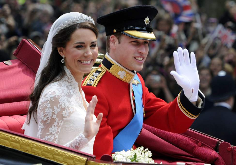 CP
Britain's Prince William and his bride Kate, Duchess of Cambridge, leave Westminster Abbey, London, following their wedding, Friday April 29, 2011. (AP Photo/Tom Hevezi)