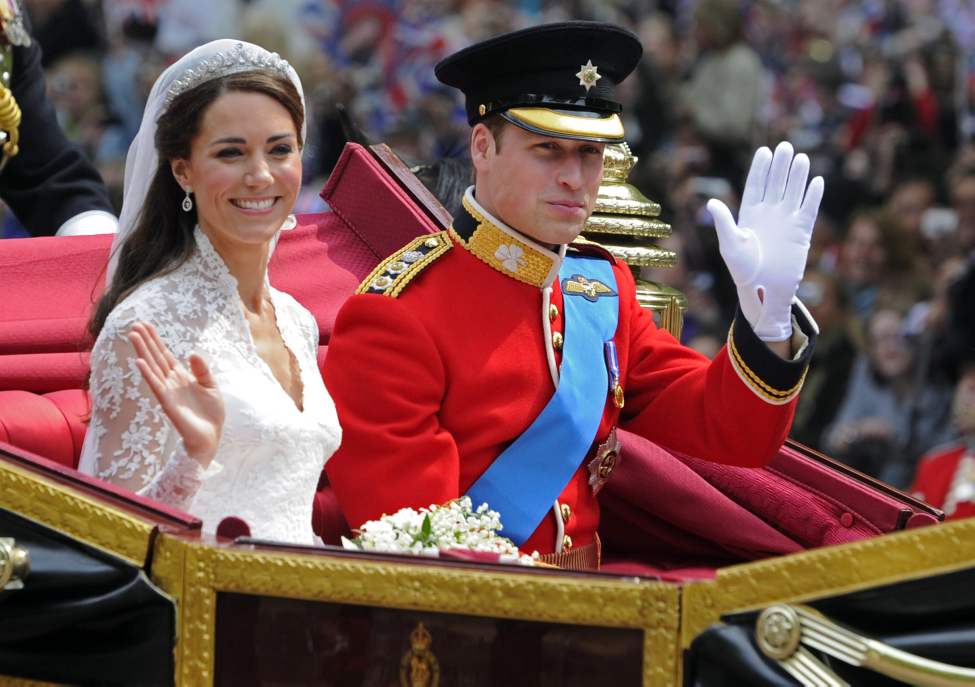 CP
Britain's Prince William and his bride Kate, Duchess of Cambridge, leave Westminster Abbey, London, following their wedding, Friday April 29, 2011. (AP Photo/Tom Hevezi)