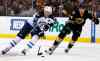 Winslow Townson / The Associated Press
Winnipeg Jets' Blake Wheeler skates past Boston Bruins' Carl Soderberg, right, during the first period of an NHL hockey game in Boston Friday.