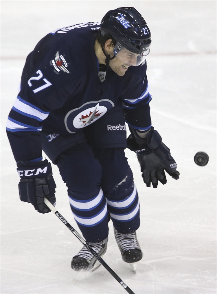 Trevor Hagan / Winnipeg Free Press
Eric Tangradi makes one of four blocks in a single shift during the third period.