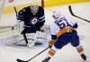 Trevor Hagan / Winnipeg Free Press
New York Islanders' Frans Nielsen puts the puck past Winnipeg Jets' goaltender Ondrej Pavelec to open the scoring during first period action.