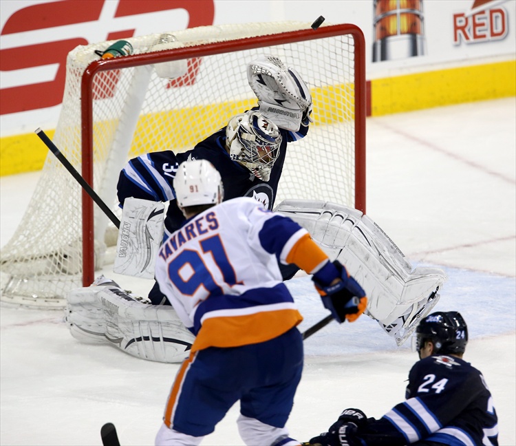 Trevor Hagan / Winnipeg Free Press
Ondrej Pavelec stops John Tavares during overtime.