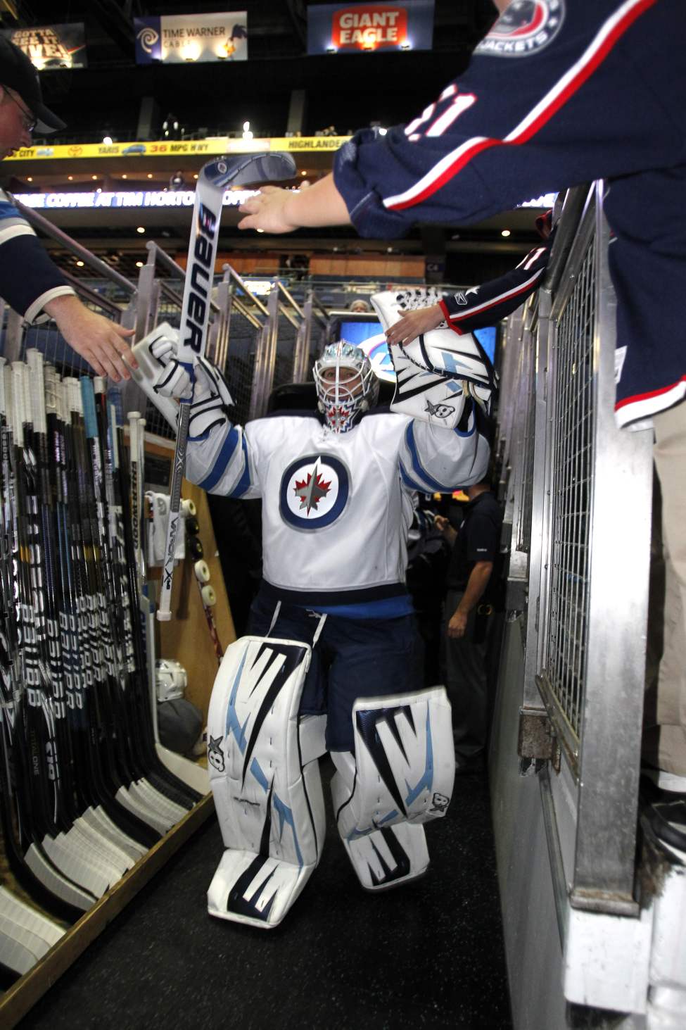 The Winnipeg Jets vs.Columbus Blue Jackets at Nationwide Arena in Columbus, Ohio. The Winnipeg Jets goalie Chris Mason leads the charge. Sept. 19, 2011 (BORIS MINKEVICH / WINNIPEG FREE PRESS)