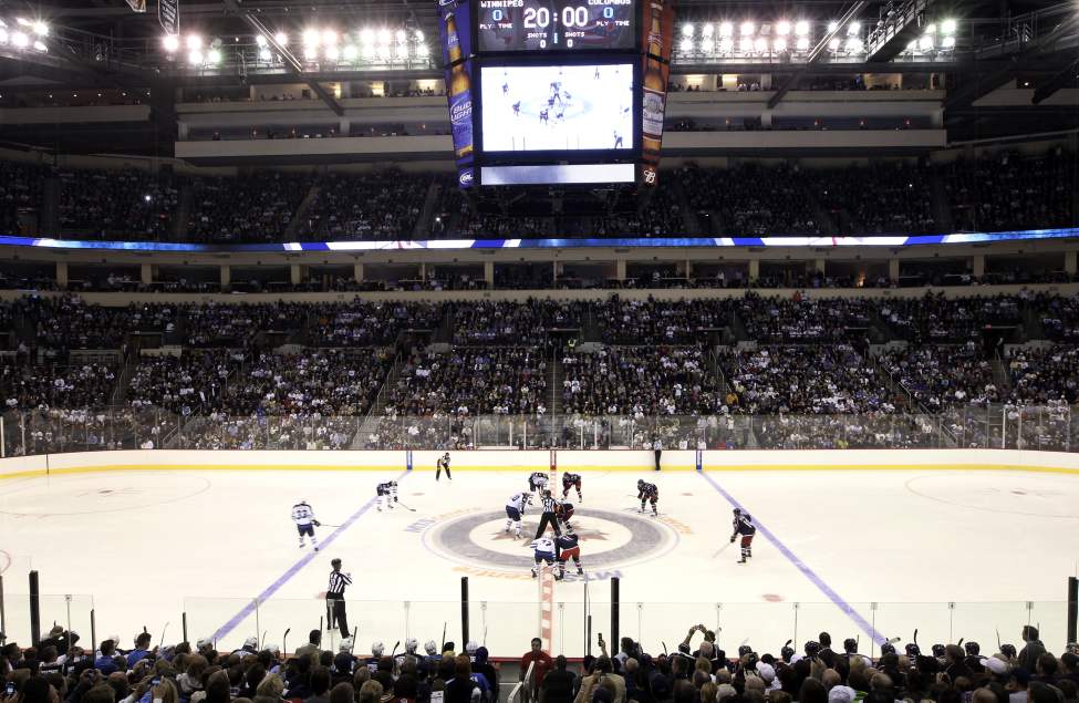 The Winnipeg Jets face-off against the Columbus Blue Jackets at the MTS Center in Winnipeg during pre-season NHL action-The Winnipeg Jets returned to Winnipeg after a 15 year drought since 1996 when the team relocated to Phoenix.
(JOE BRYKSA / WINNIPEG FREE PRESS)