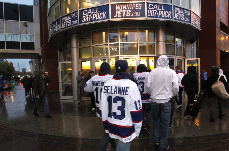 Winnipeg Jets fans arrive at the MTS Centre Tuesday for the exhibition game between the Winnipeg Jets and the Columbus Blue Jackets. (WAYNE GLOWACKI/WINNIPEG FREE PRESS)