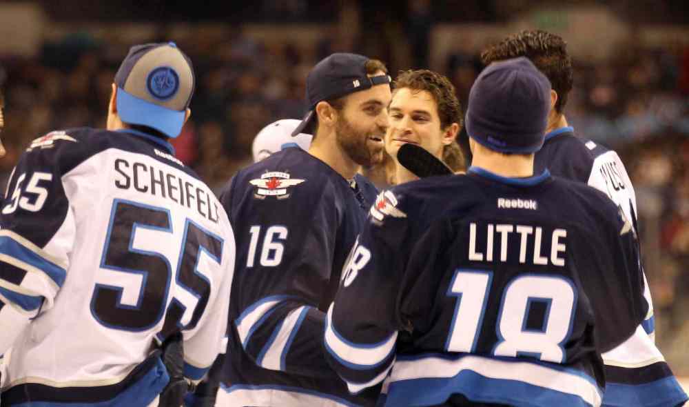 Phil Hossack / Winnipeg Free Press
Left to right, Mark Scheiflele, Andrew Ladd and Bryan Little enjoy the annual Winnipeg Jets Skills Competition.