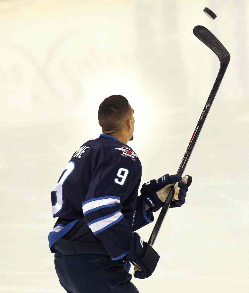Phil Hossack / Winnipeg Free Press
Evander Kane shows off a little improv stick work at the annual Winnipeg Jets Skills Competition.
