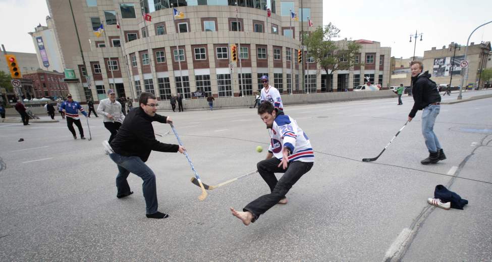 Hockey fans gathered at Portage and Main to celebrate the return of the NHL to Winnipeg, MB. (MIKE DEAL / WINNIPEG FREE PRESS)