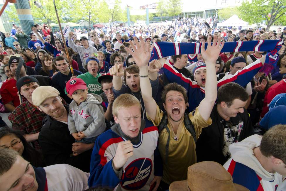 Winnipeg hockey supporters rally at The Forks in Winnipeg, Tuesday May 31, 2011 after the announcement that an NHL team will be returning to the city after 15 years. (DAVID LIPNOWSKI / THE CANADIAN PRESS)